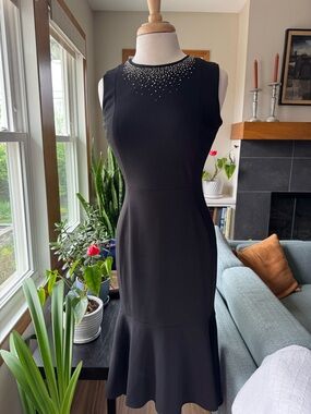Calvin Klein Sleeveless Black Mermaid Hem Dress with Embellished Neckline.